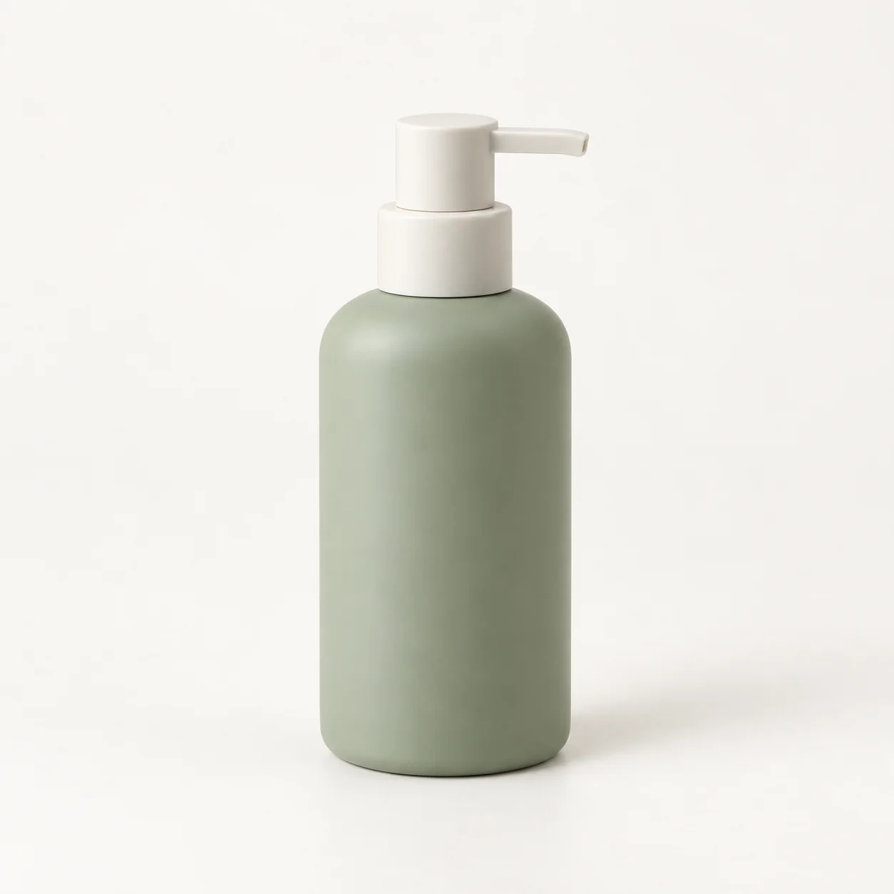 Sage soap bottle with an ivory pump on a neutral background